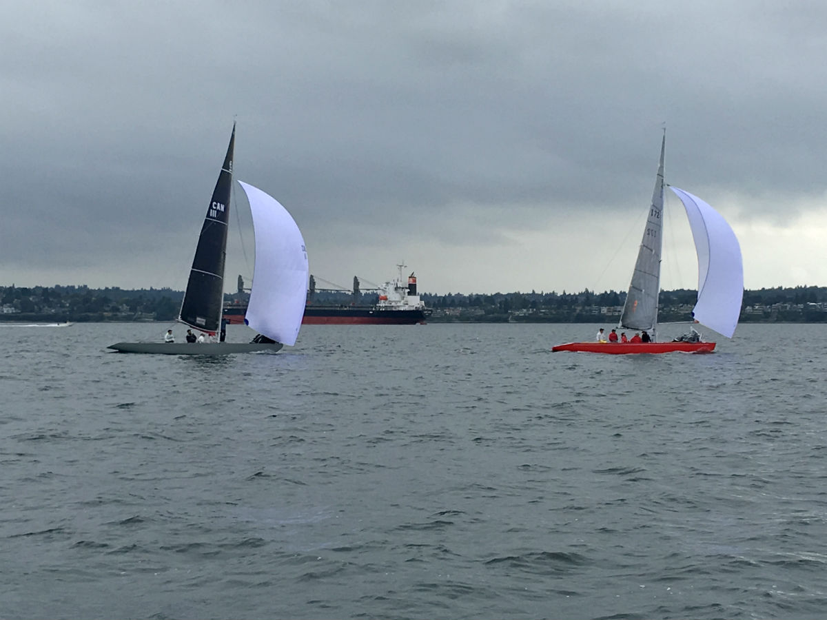 Oceana Cup races in Vancouver harbour September 2017, red boat Nuvolari with Team New Zealand lead