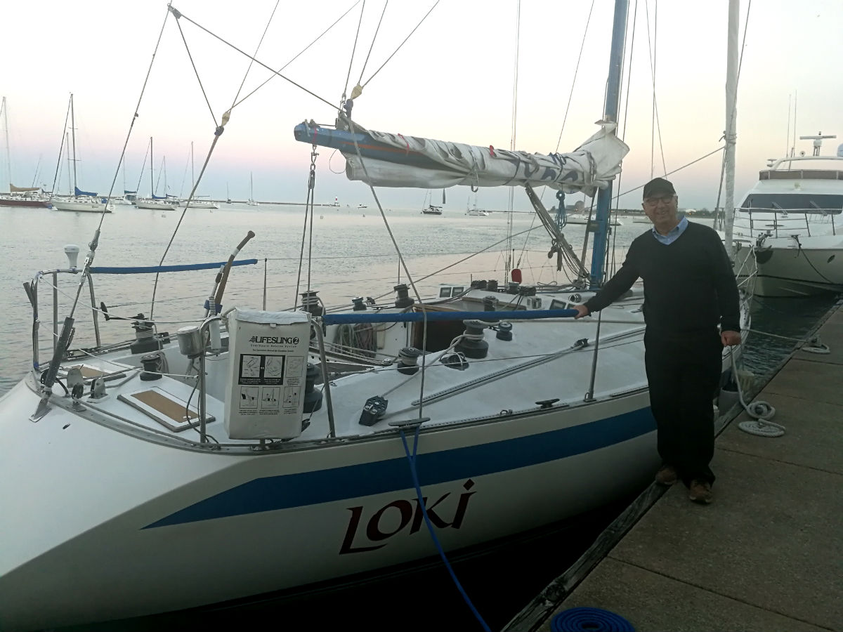 Ron Holland along side Loki sailing yacht in Chicago USA